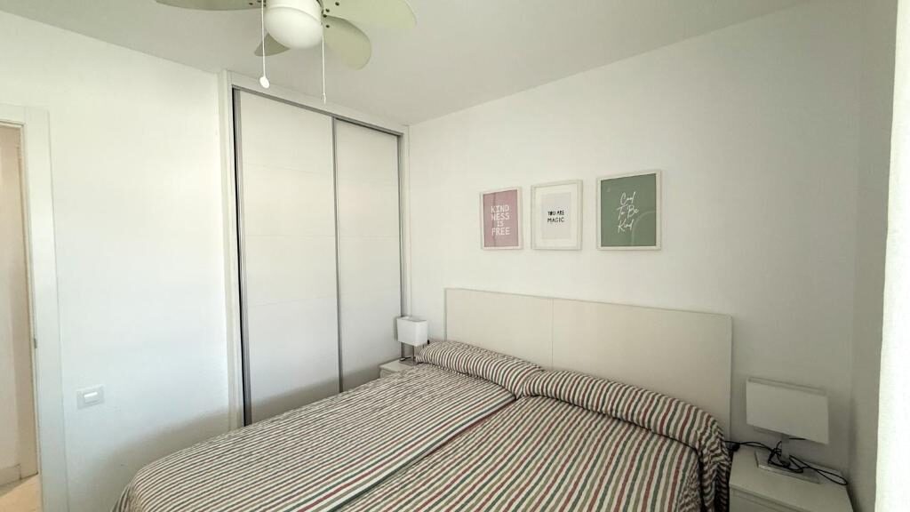 Bright apartment bedroom with twin beds